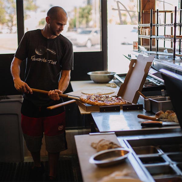 Pizza Chef Preparing Fresh Pie